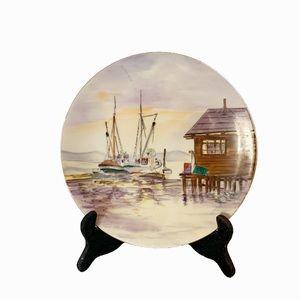 Vintage Norcrest ceramic deco plate.  Has a ship & ocean scene. 10 inch diameter